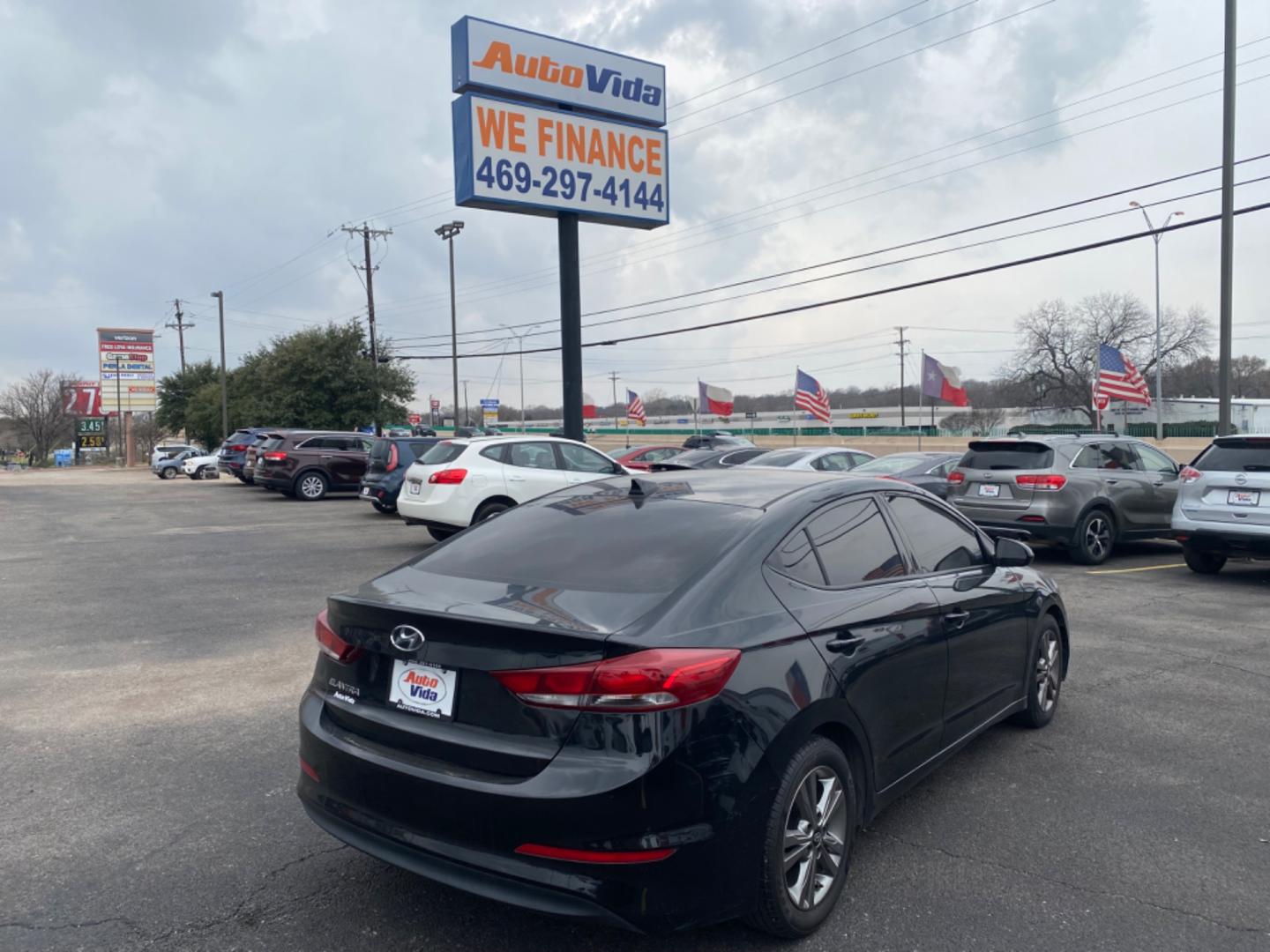 2017 BLACK Hyundai Elantra Limited (5NPD84LF5HH) with an 1.8L L4 DOHC 16V engine, 6A transmission, located at 420 I-35E, Lancaster, TX, 75146, (469) 297-4144, 32.593929, -96.823685 - Photo#3